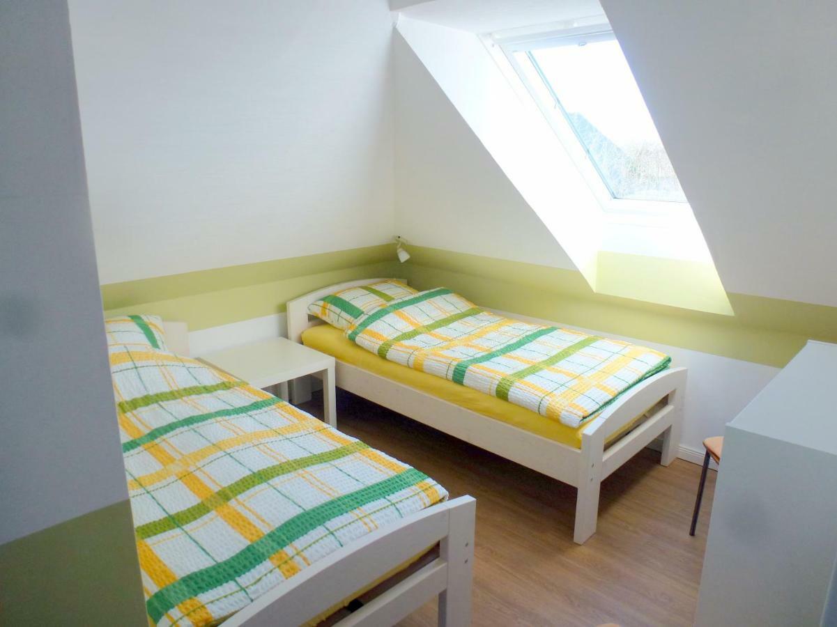 Ferienwohnung Am Runenstein 7 Busdorf ภายนอก รูปภาพ